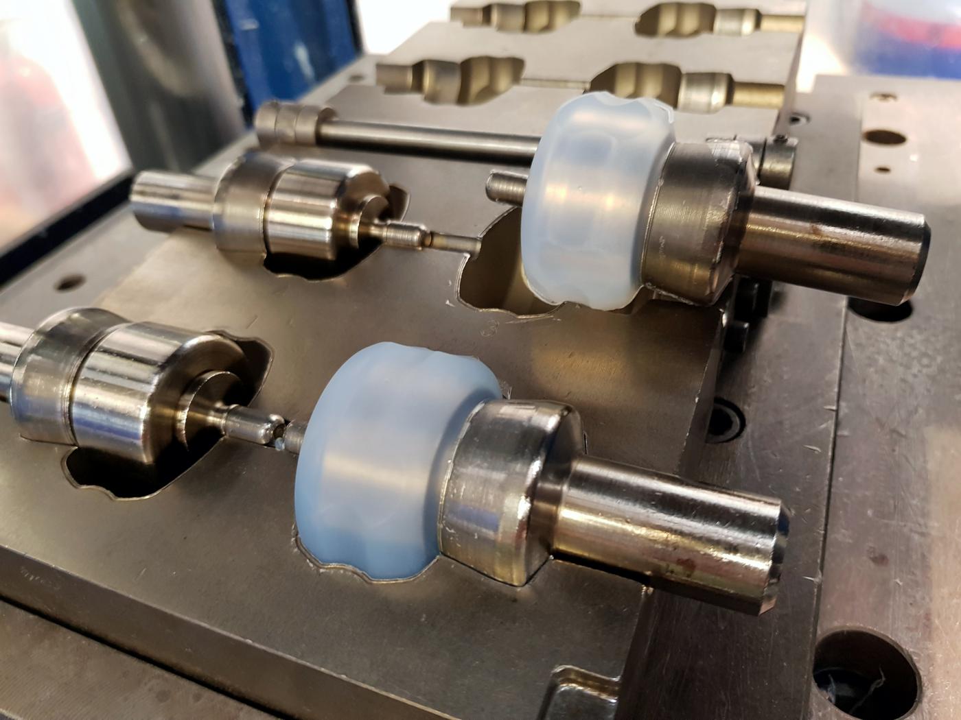 Silicone parts on tooling core pins
